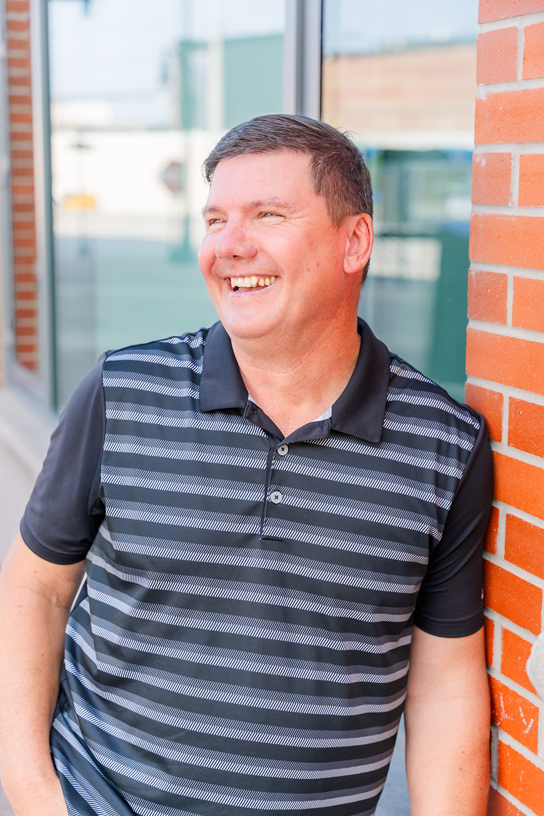 Paul Kiss looking to the right and smiling